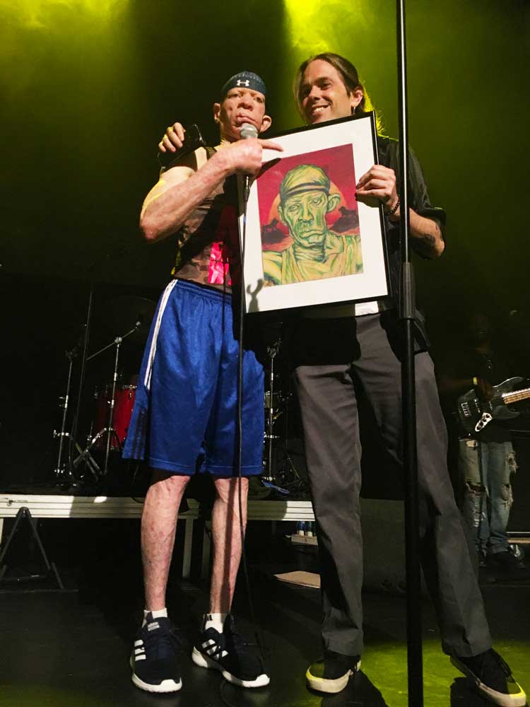 With Yellowman onstage with Yelloman portrait drawing. Polychromos colored pencils on Strathmore Toned Tan 118 gr (27,9x35,6) @ Q-Factory (2019) (svenimal.art)